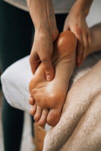 De-armouring therapy being performed on the foot