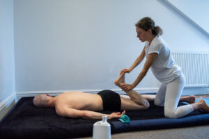 Tatiana Aitken giving tantric massage and therapy session to male client in London
